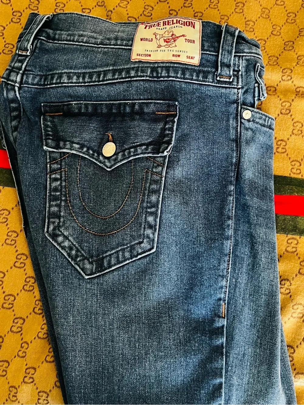 True Religion Jeans with Red Logo Patch on Blue denim NWOT pristine